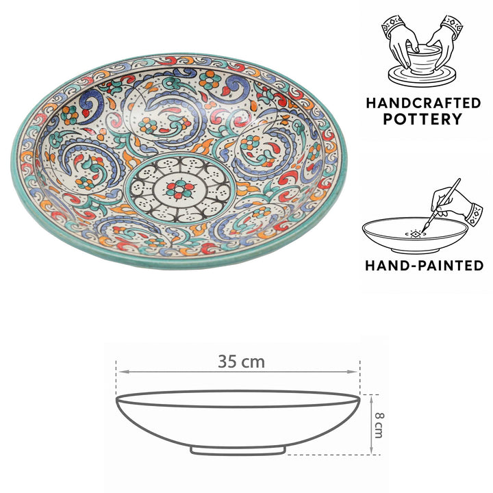Handbemalte marokkanische Keramikschale mit türkisfarbenem Rand, floralen Ornamenten und Maßangaben Ø 35 cm und Höhe 8 cm